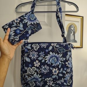 Cute blue Vera Bradley bag with matching wallet. Like New. Great condition.